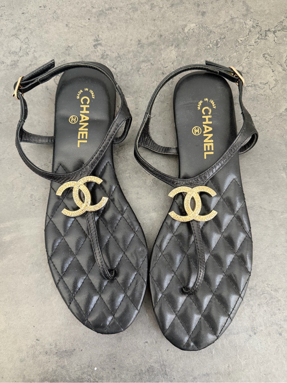 Black Quilted Leather Sandals with Gold Medallions